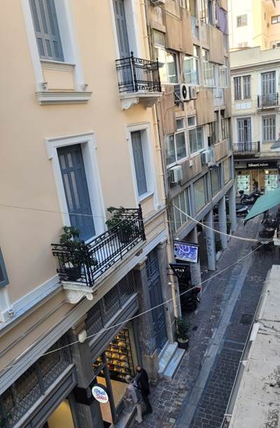 A picture containing outdoor, apartment building

Description automatically generated